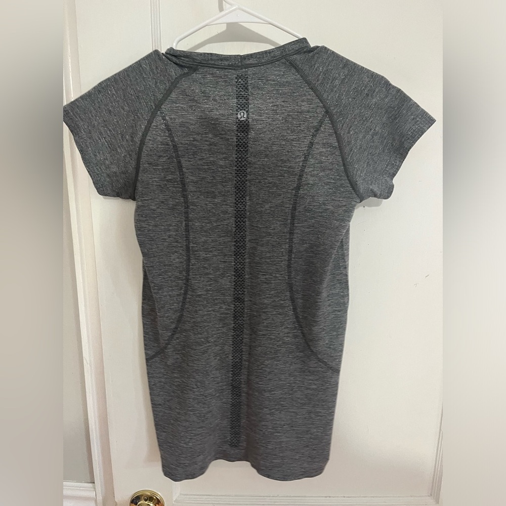 Lululemon Swiftly Tech Tee! Gray with a bit of shimmer in the fabric.
